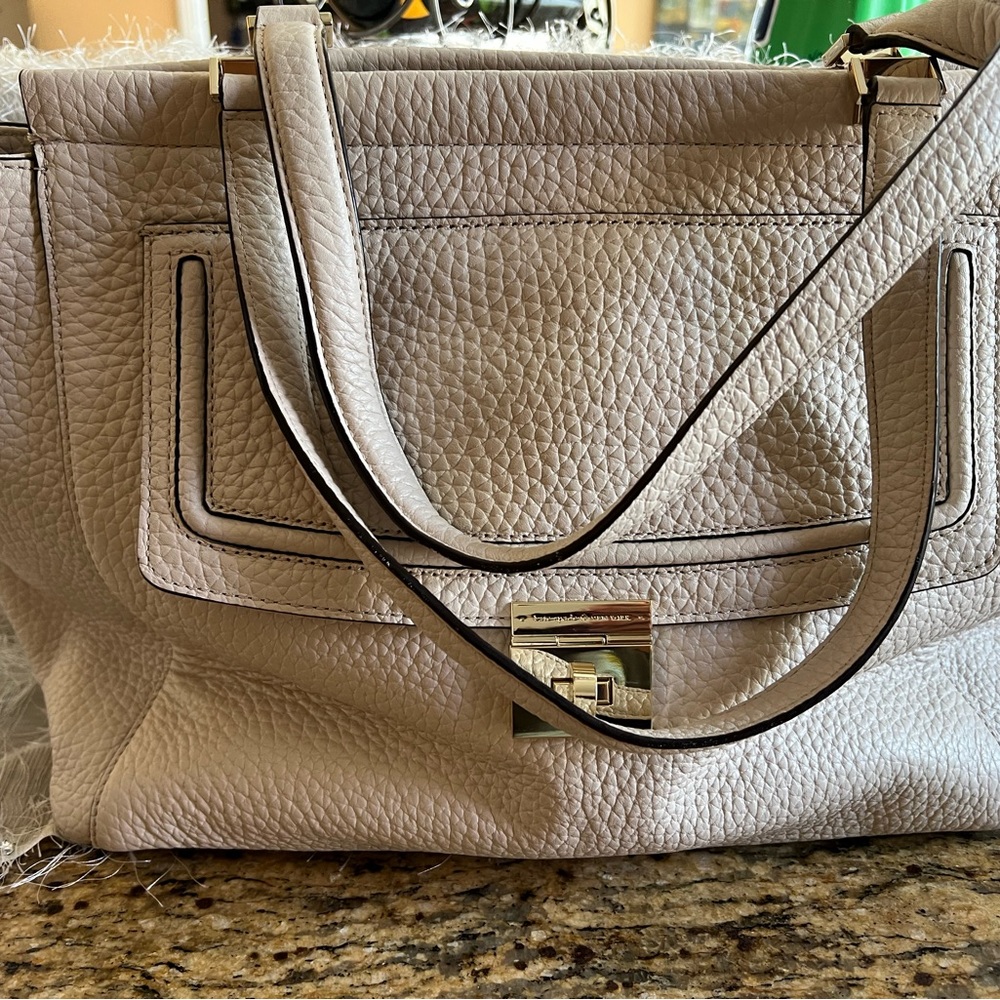 Kate Spade cream colored large bag.